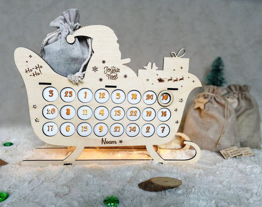 Wooden advent calendar to personalize in the shape of a Christmas sleigh